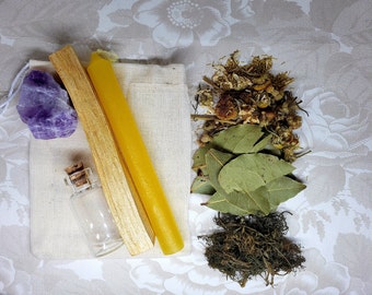 May include: A set of natural ingredients for a spiritual ritual, including a small bottle, a yellow candle, a wooden stick, a purple amethyst crystal, dried bay leaves, dried chamomile flowers, and dried moss.