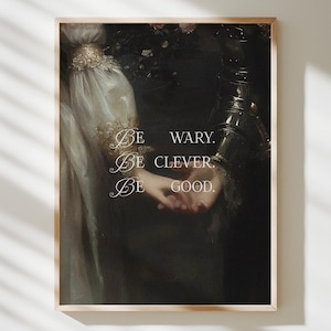 Może przedstawiać: Oprawiony wydruk artystyczny z obrazem w stylu vintage z tekstem "Be wary. Be clever. Be good." Grafika przedstawia postacie w historycznych strojach, ze szczególnym uwzględnieniem dłoni i zdobionych rękawów. Kolorystyka jest ciemna i stonowana.