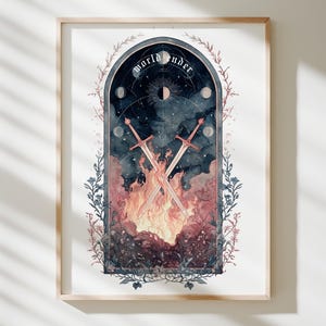 Puede incluir: Impresi&oacute;n art&iacute;stica enmarcada con una ilustraci&oacute;n en acuarela. La obra representa dos espadas cruzadas sobre una escena de fuego, con las palabras "world under" arqueadas en la parte superior. El dise&ntilde;o incluye elementos celestiales y bordes florales.