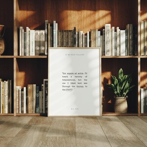 May include: A framed print with a quote by W.B. Yeats, "Per aspera ad astra. I'd heard a variety of translations, but the one I liked best was Through the thorns, to the stars."