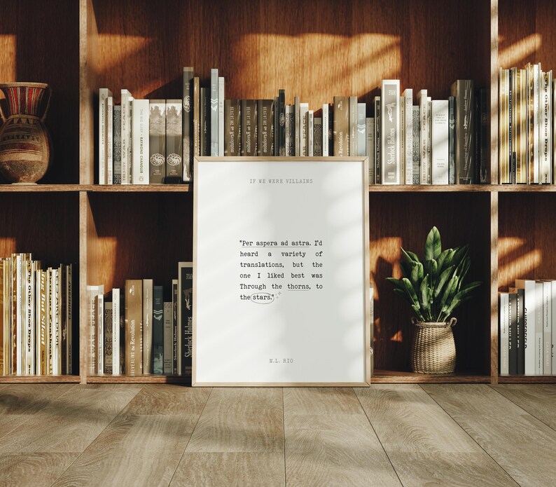 May include: A framed print with a quote by W.B. Yeats, "Per aspera ad astra. I'd heard a variety of translations, but the one I liked best was Through the thorns, to the stars."
