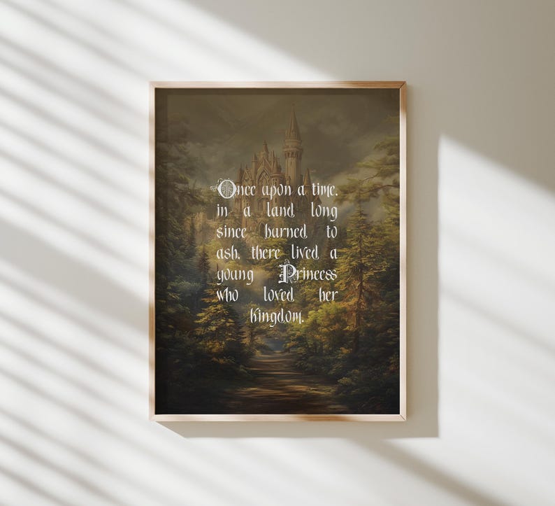 May include: A framed print featuring a fairytale scene with a castle and forest. The text "Once upon a time...a young Princess who loved her kingdom" is displayed in white script. The artwork has a vintage, storybook aesthetic.