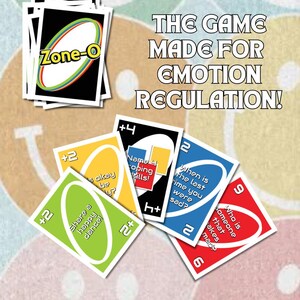 May include: A card game called "Zone-O" with various coloured cards. The cards have prompts like "Share a happy dance!" and "Who is someone that makes you mad?" The text on the image reads "THE GAME MADE FOR EMOTION REGULATION!"