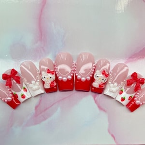 Cute white/ red strawberry press on nails w/ pearls and bows