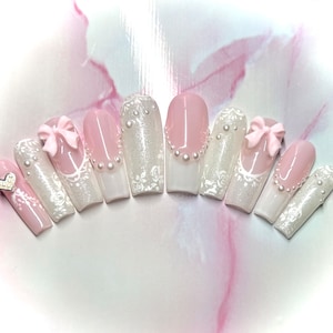 Cute white shimmer kawaii press on nails w/ pearls and pink bows