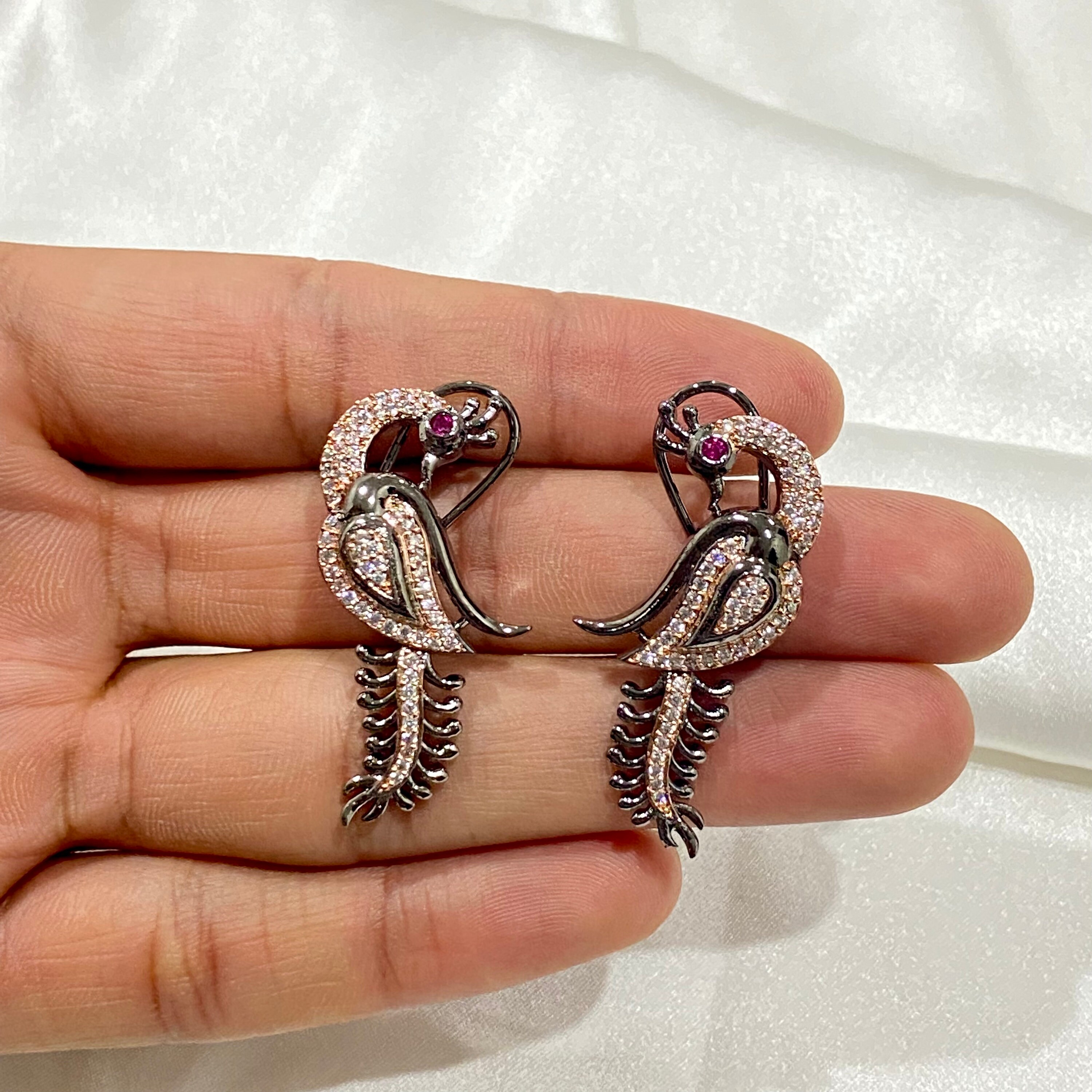 Peacock shaped best sale earrings