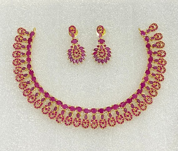 TANISHQ 511182NVOAAA182BA900557 Nigaah Ruby Necklace in Coimbatore at best  price by Tanishq - Justdial