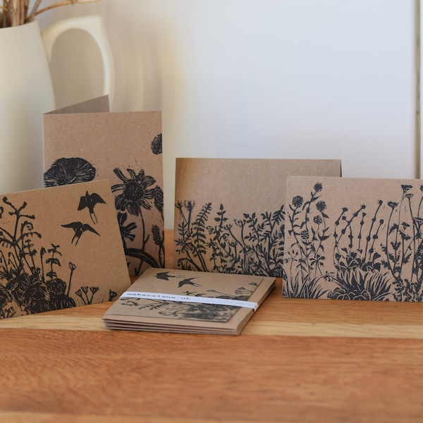 Hand-printed lino cut cards inspired by the hedgerows and flowers of Devon. Pack of 4. Click to view..