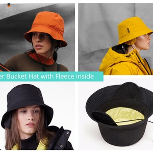 May include: A collection of winter bucket hats in various colors. The hats are shown in orange, yellow, and black. The hats have a fleece lining and ear flaps for warmth. The text "Winter Bucket Hat with Fleece inside" is displayed.