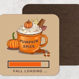 May include: A brown and orange mug with the text "Pumpkin Spice" on it. The mug is filled with a white whipped cream topping and a small orange pumpkin. The mug is surrounded by brown cinnamon sticks and leaves. A progress bar is below the mug with the text "Fall Loading..." underneath.