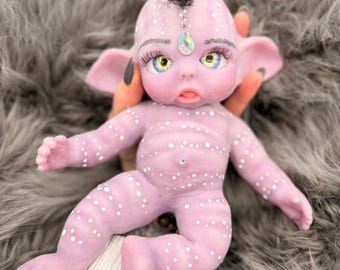 Custom order Mabel purple Starling silicone baby