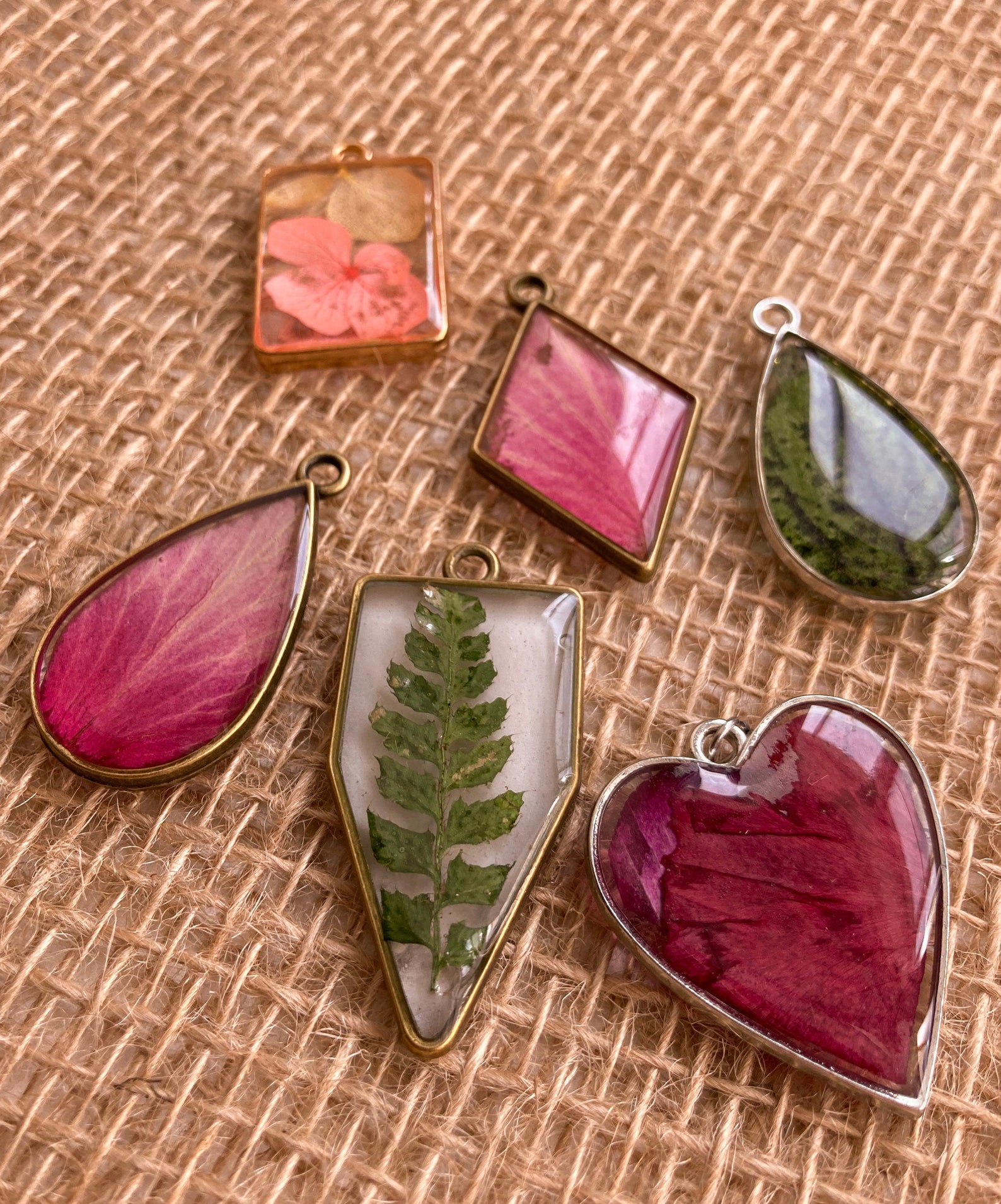 Handmade jewelry made of dried flowers. The pendant is made of Etsy