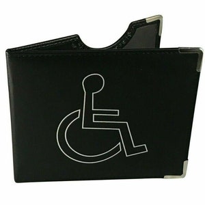 May include: Black leather wallet with a silver wheelchair symbol embossed on the front.