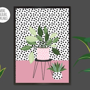 May include: A framed print featuring a pink background with two potted plants. The larger plant has green leaves and is in a pink and white polka dot pot. The smaller plant has green leaves and is in a black and white polka dot pot. The background is a black and white polka dot pattern.