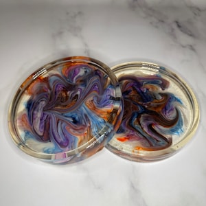 Round coasters set of two, colored blue, purple, and red (4 in diameter)