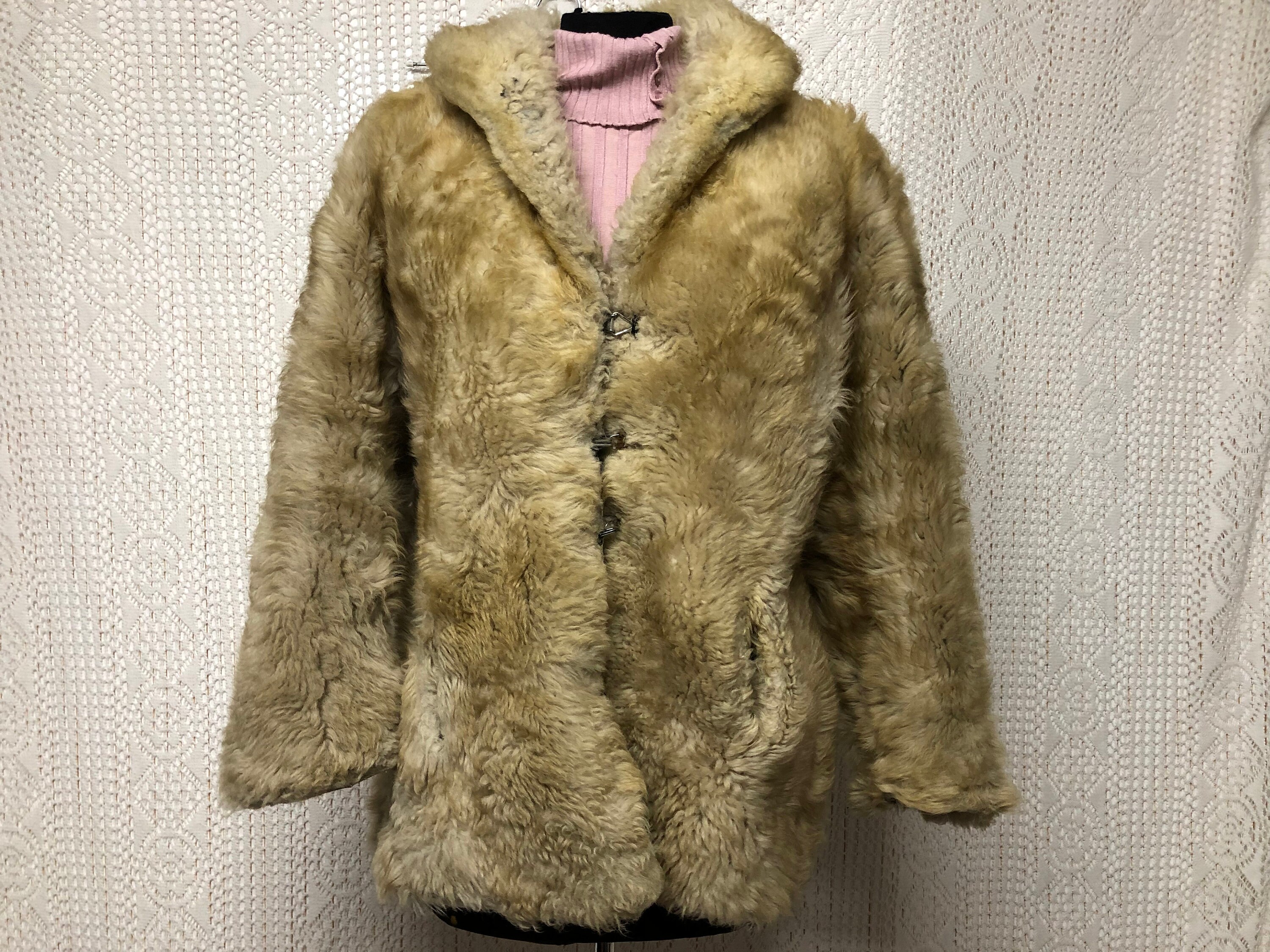 Achat de vieux manteau de fourrure sale