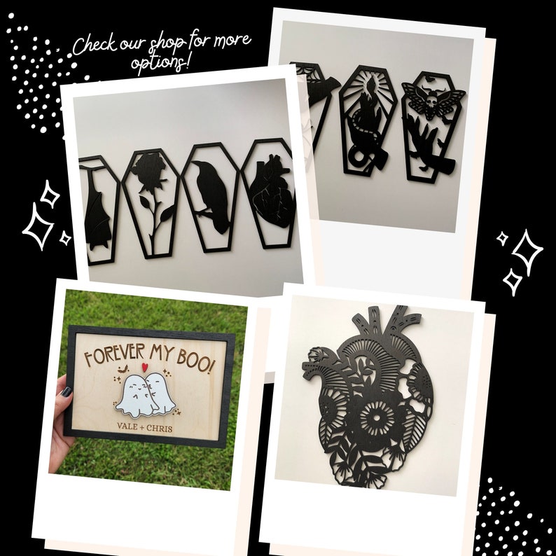 May include: A set of four black wooden wall decor pieces featuring a heart, a crow, a rose, and a coffin. The pieces are arranged in a row and have a rustic, gothic aesthetic. The text "Forever My Boo!" is written on a wooden sign with a heart and two ghosts.