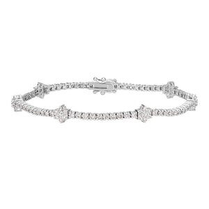 May include: A silver tennis bracelet with a row of small diamonds and three larger diamond clusters.