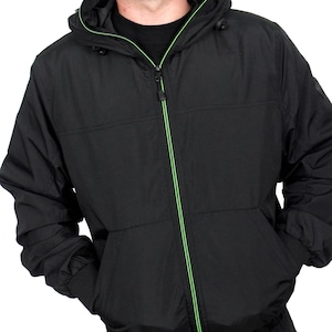 May include: A black hooded jacket with a green zipper and green trim around the hood.