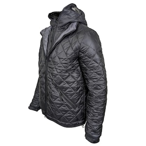 May include: A black quilted jacket with a hood and a goggle detail on the hood.