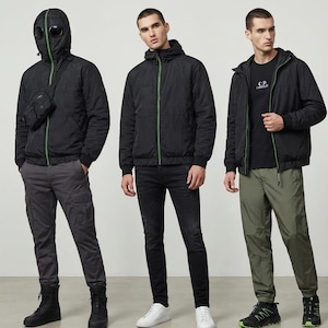 May include: Three black hooded jackets with green zipper accents. The first jacket features a hood with integrated circular lenses, worn with a black crossbody bag, gray cargo pants, and black boots. The others are worn with black jeans or olive joggers.