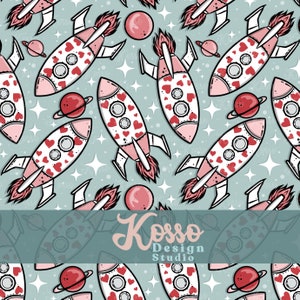 May include: A seamless pattern featuring pink and white rockets with hearts on a light blue background. The rockets have flames and are surrounded by stars and planets. The text "Kosso Design Studio" is at the bottom of the image.