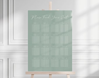 May include: A sage green seating chart displayed on a wooden easel. The chart features the text "Please Find Your Seat" in elegant script, with guest names listed under table numbers. Ideal for weddings or events.
