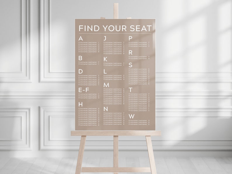 May include: A brown seating chart with the text "FIND YOUR SEAT" at the top. The chart is divided into columns with letters from A to W and lists names under each letter.