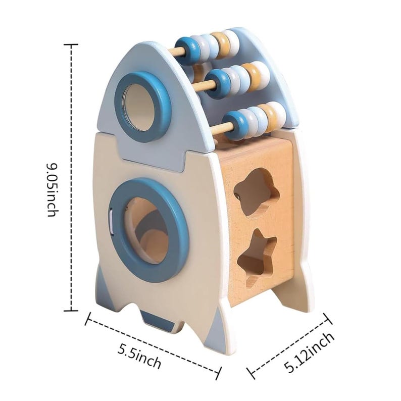 May include: A wooden rocket-shaped toy with a light blue and natural wood finish. It features an abacus on top and shape sorter cutouts on the side. The toy measures 9.05 inches tall, 5.5 inches wide, and 5.12 inches deep.