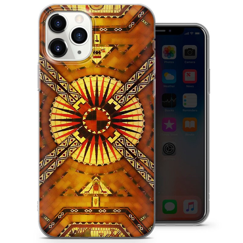 May include: A phone case with a geometric design featuring a circular pattern with red, yellow, and black accents. The design is reminiscent of a stained glass window.