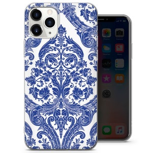 May include: A clear phone case with a white background and a blue damask pattern. The case is designed for an iPhone.