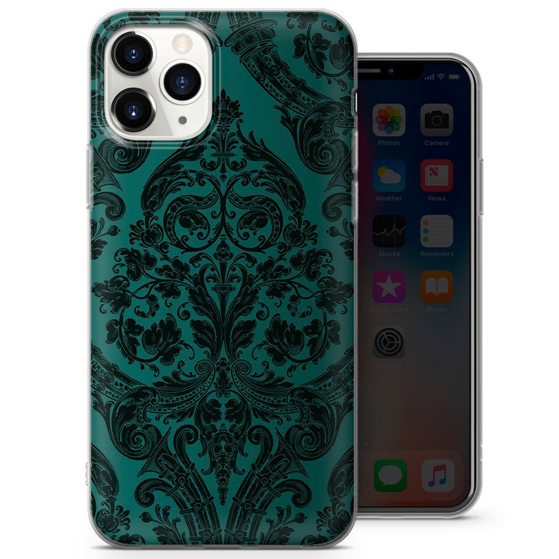 May include: A teal and black phone case with a damask pattern. The case is made of clear plastic and has a raised lip around the camera lens.