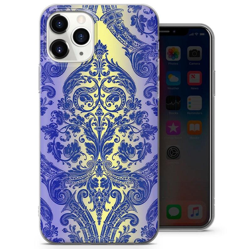 May include: A clear phone case with a blue and yellow damask pattern. The case is designed for an iPhone with a camera bump.