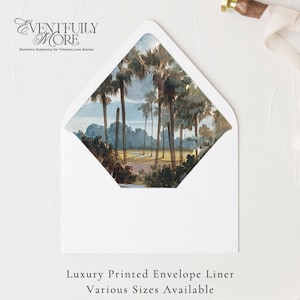 May include: White envelope with a printed landscape scene of palm trees. The envelope liner features a detailed painting of a tropical landscape. The text "EVENTFULLY MORE" and "Romantic Stationery for Timeless Love Stories" is visible.