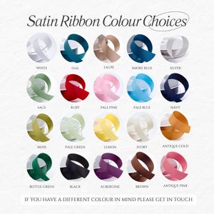 May include: A color chart of satin ribbon options. The chart displays 20 different ribbon colors, including white, teal, taupe, smoke blue, silver, sage, ruby, pale pink, pale blue, navy, moss, pale green, lemon, ivory, antique gold, bottle green, black, aubergine, brown, and antique pink.