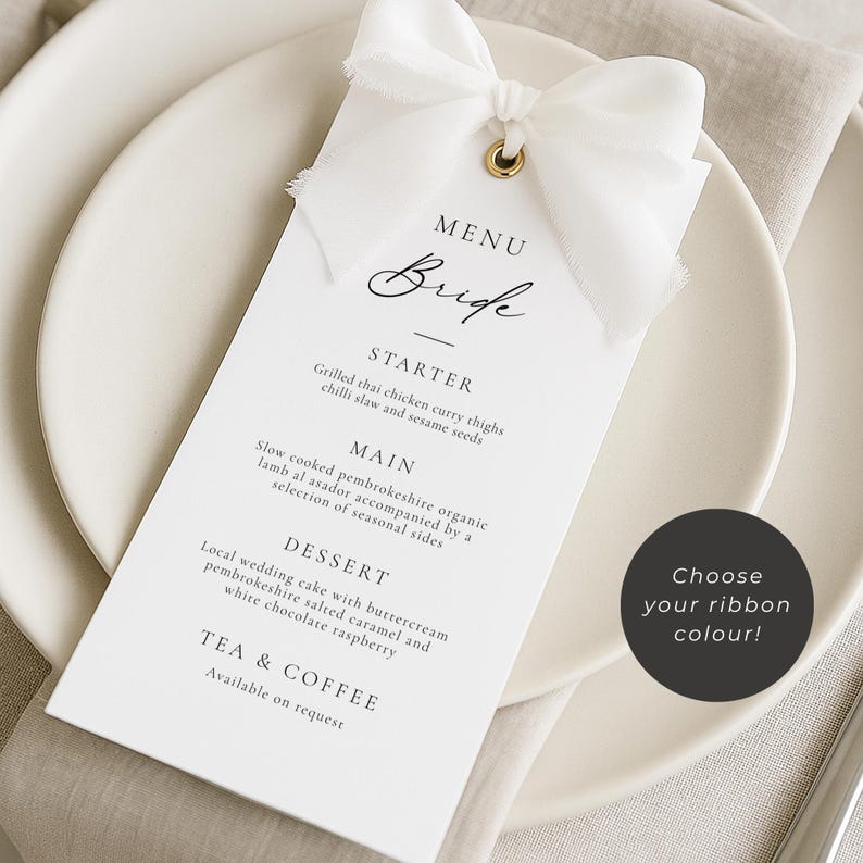 May include: A white menu card with a white ribbon bow, featuring the word "Bride" in elegant script. The menu lists starter, main, and dessert options. A circular graphic says "Choose your ribbon color!"