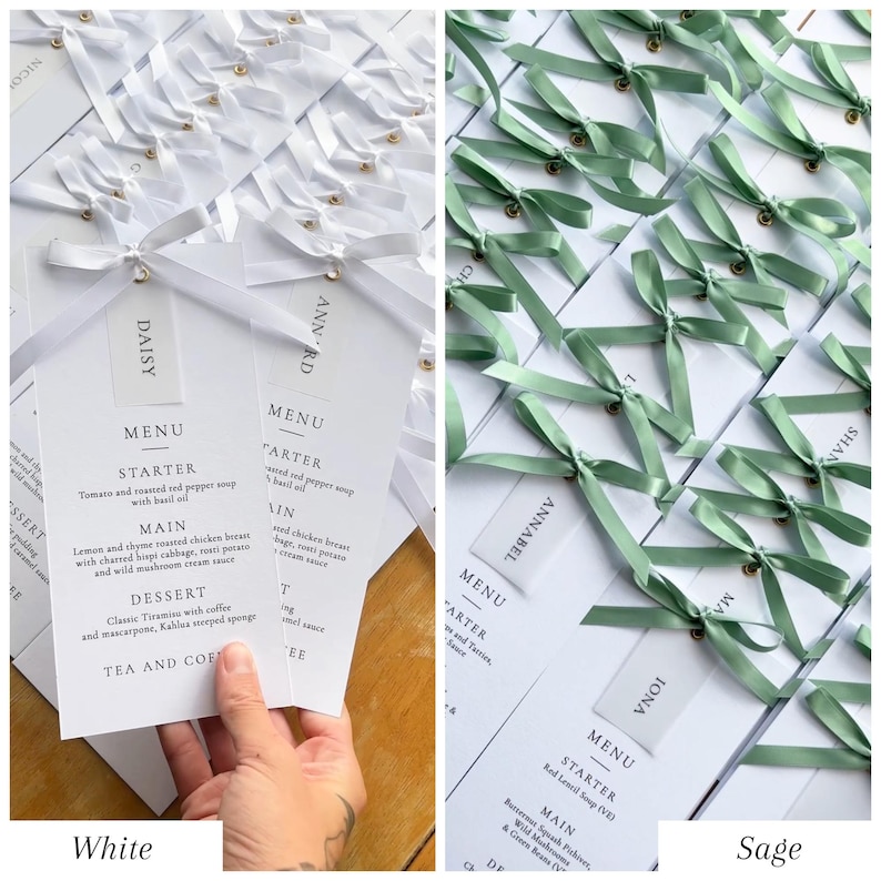 May include: White and sage green wedding menu cards with attached name tags. The cards feature menu details and are tied with satin ribbons. The white cards have white ribbons, and the sage cards have sage green ribbons.