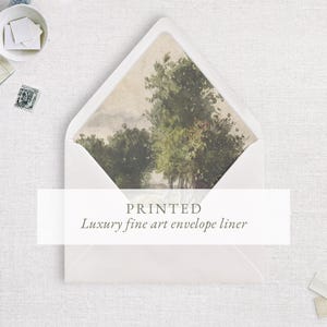 May include: A white envelope with a printed luxury fine art envelope liner featuring a landscape painting of trees and foliage. The text "PRINTED Luxury fine art envelope liner" is displayed on the front.