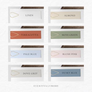 May include: Eight color swatches with gold paper clips. The colors are linen, almond, terracotta, moss green, pale blue, blush pink, dove grey, and dusky blue. The text "EVENTFULLYMORE" is at the bottom of the image.