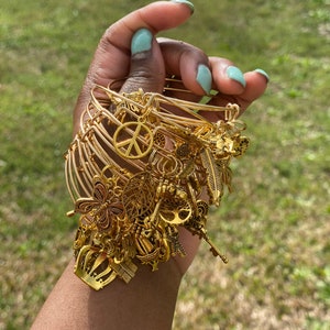 Designer gold bracelet best sale