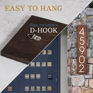 May include: A wooden house number sign with the numbers 45902 in white lettering on a brown background. The sign is mounted on a stone wall and includes a D-hook for easy hanging.