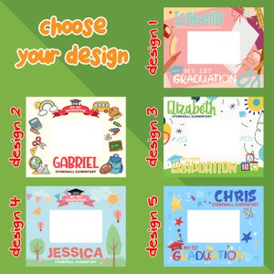 May include: Five different graduation photo frame designs featuring colourful illustrations of school supplies, a bus, a graduation cap, a hot air balloon, a bird, a sun, stars, and a rainbow. Each design has a blank space for a photo and includes the text "My 1st Graduation" and the name of the school, "Stonewall Elementary".