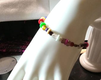 A dainty multi colored beaded bracelet.