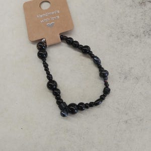 A black beaded bracelet