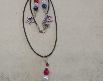 A Patriotic red, white and blue necklace and earrings set.