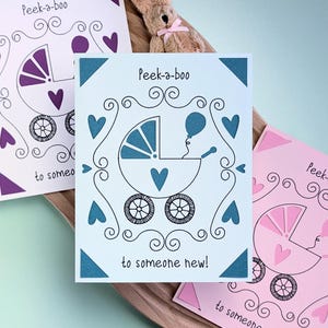 May include: Three baby shower cards with a peek-a-boo design. Each card features a stroller with a heart and a balloon. The strollers are colored purple, teal, and pink.