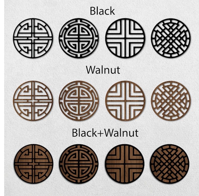 May include: Three sets of four decorative round wood wall plaques with geometric designs. The first set is black, the second set is walnut, and the third set is a combination of black and walnut.