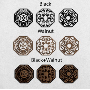 May include: Three octagonal wood wall decorations in black, walnut, and black and walnut. Each piece features a different geometric design.