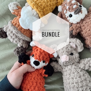 May include: A crochet pattern bundle featuring five adorable amigurumi animal toys: a gnome, a fox, a deer, a mouse, and a pig. The toys are made with soft, fluffy yarn and have charming details like embroidered eyes and noses.