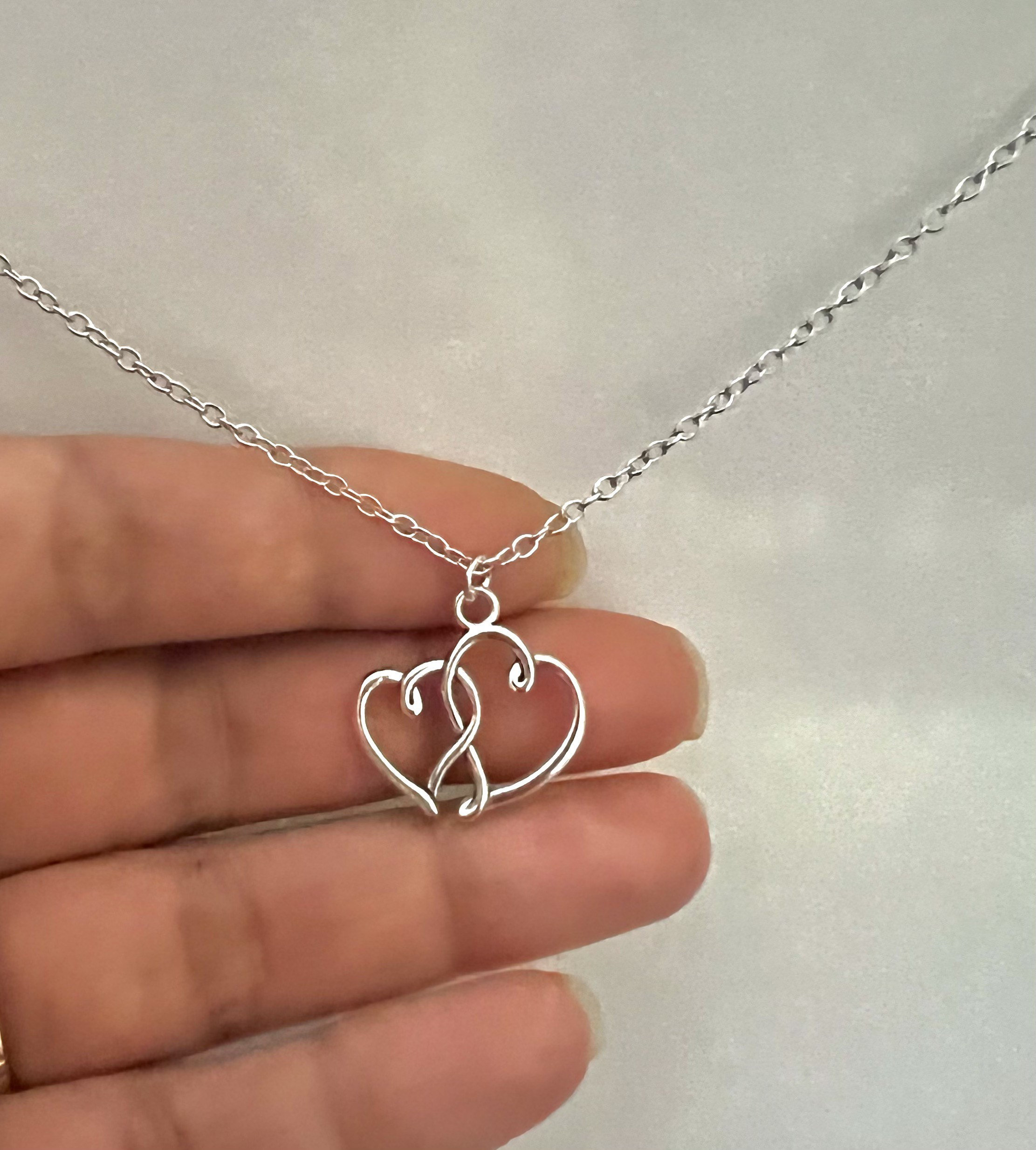 Double heart charm sale necklace